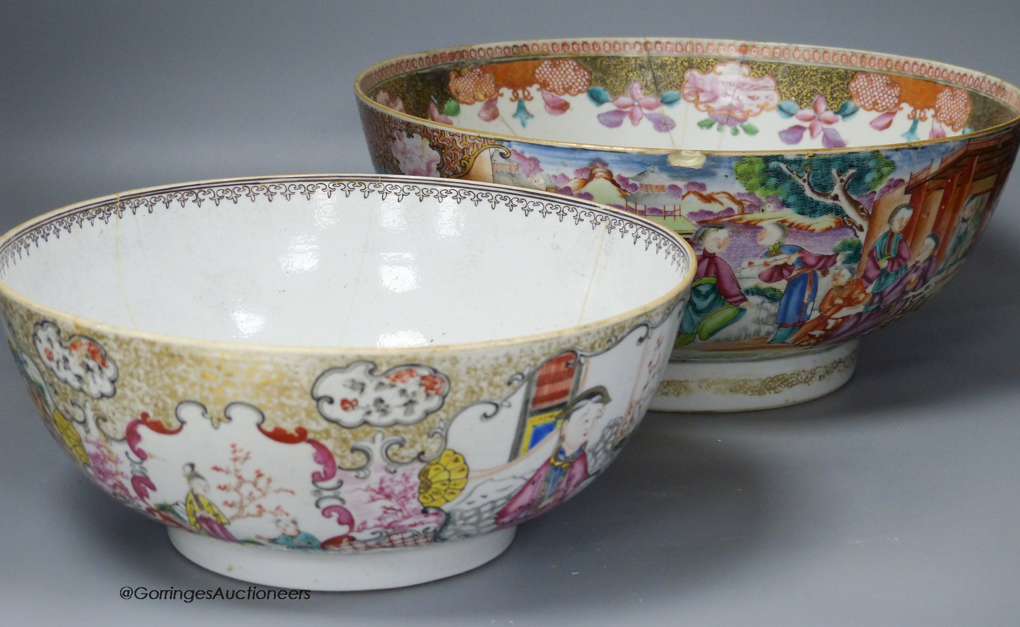 An 18th century Chinese Export famille rose punch bowl and another similar bowl (a.f.), largest 32cm diameter